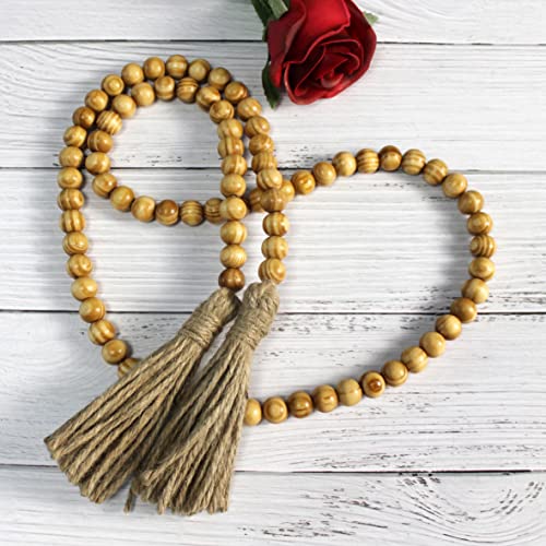 CVHOMEDECO. Wood Grain Beads Garland with Tassels Farmhouse Rustic Wooden Prayer Bead String Wall Hanging Accent for Home Festival Decor. Light Tan - color: Light Tan