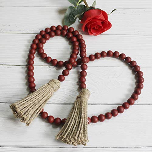 CVHOMEDECO. Wood Beads Garland with Tassels Farmhouse Rustic Wooden Prayer Bead String Wall Hanging Accent for Home Festival Decor. Burgundy - color: Burgundy