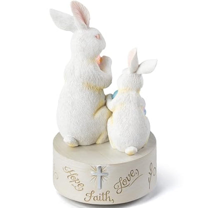 AIDLNS Christian Easter Bunny Music Box – He is Risen Religious Figurine with Cross Hope Faith Love Engraving Wind Up Music Box Play Easter Parade