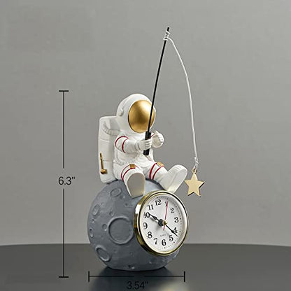 Astronaut Figure Clock for Desktop & Shelf, Battery Operated, Astronaut & Planet Figurine Statue for Office & Outer Space Themed Bedroom Decor, Decorative Small Table Clock, Fishing Star