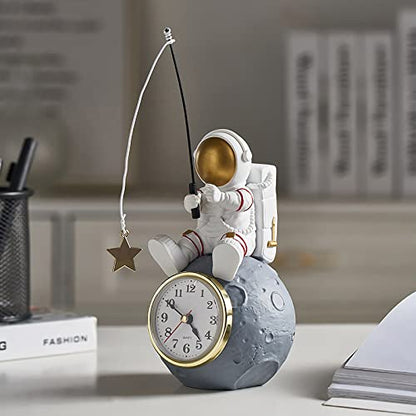 Astronaut Figure Clock for Desktop & Shelf, Battery Operated, Astronaut & Planet Figurine Statue for Office & Outer Space Themed Bedroom Decor, Decorative Small Table Clock, Fishing Star
