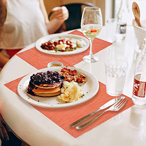 GIVERARE Placemats Set of 4, Heat-Resistant Woven Vinyl Placemat, Non-Slip Washable PVC Table Mat, Easy to Clean Premium Plastic Mats for Dining, Kitchen Table (Orange) - color: Orange