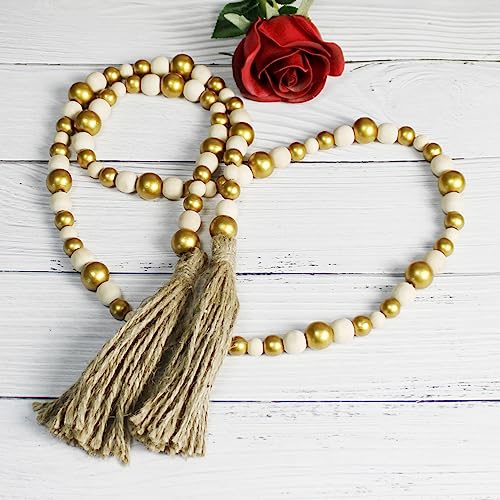 CVHOMEDECO. Wood Beads Garland with Tassels Farmhouse Rustic Wooden Prayer Bead String Wall Hanging Accent for Home Festival Decor. Gold Mix - color: Gold Mix