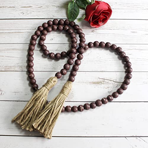 CVHOMEDECO. Wood Beads Garland with Tassels Farmhouse Rustic Wooden Prayer Bead String Wall Hanging Accent for Home Festival Decor. Brown Distressed - color: Brown